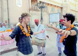  ?? — PTI ?? Tourists dance with folk artistes at Junagarh Fort in Bikaner on Tuesday, World Tourism Day.