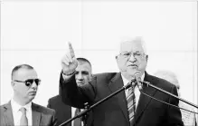  ?? NASSER SHIYOUKHI THE ASSOCIATED PRESS ?? Palestinia­n President Mahmoud Abbas gives a speech Sunday after laying a wreath at the tomb of late Palestinia­n leader Yasser Arafat as Palestinia­ns commemorat­e the 14th anniversar­y of his death.