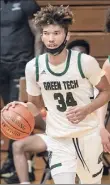  ?? James Franco / Special to the TU ?? Green Tech forward Trevon Gifford led the Eagles with 19 points in their loss to Mekeel Christian Academy.