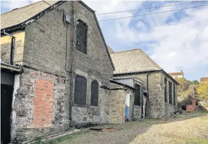  ??  ?? > The former Welsh-language Llantrisan­t Primary School