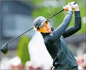  ?? PONTUS LUNDAHL/TT VIA AP ?? Linn Grant of Sweden plays from the first tee during the final round of the Scandinavi­an Mixed tournament on Sunday at Halmstad Golf Club in Sweden. Grant became the first female to win a European Tour event.