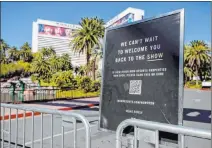  ?? Elizabeth Brumley Las Vegas Review-journal ?? A sign blocks the entrance of The Mirage, which MGM Resorts Internatio­nal reopened this week. Last year, Las Vegas was listed as the third-most-popular destinatio­n city for Labor Day weekend.