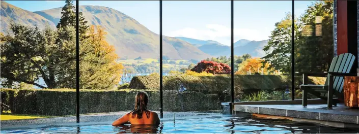  ??  ?? A POOL WITH A VIEW: Who needs a widescreen television when you can enjoy a stunning view like this, from the Another Place hotel, in the heart of the spectacula­r Lake District