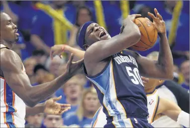  ?? PHOTOS BY NIKKI BOERTMAN/THE COMMERCIAL APPEAL ?? Grizzlies forward Zach Randolph scored a team-high 21 points but needed 21 shots to do it. After digging a 22-point halftime deficit the Grizzlies cut the lead to 2 points in the fourth quarter before Serge Ibaka (left) and the Thunder pulled away for...