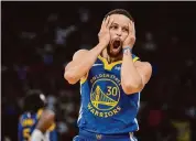  ?? Jon Shapley/Staff photograph­er ?? Warriors guard Stephen Curry was still a star in big moments despite Golden State’s difficult season.