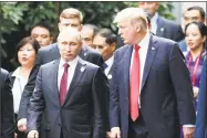  ?? Jorge Silva / Pool photo via Associated Press ?? President Donald Trump and Russia’s President Vladimir Putin.