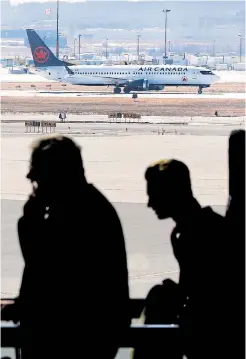  ?? RICHARD LAUTENS TORONTO STAR ?? A Boeing 737 Max 8, one of 24 in Air Canada’s fleet, sits on the tarmac after landing Tuesday at Pearson airport. Many countries have grounded the aircraft.