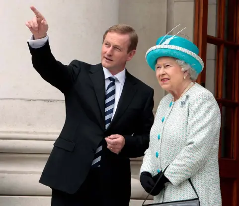  ??  ?? GIFTS: Taoiseach Enda Kenny with Britain’s Queen Elizabeth on her historic visit to Ireland