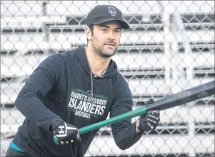  ?? FILE PHOTO ?? Jesse MacIntyre prepares to lay down a bunt at Charlottet­own Gaudet’s Auto Body Islanders batting practice during the 2017 season. The franchise will not field a team this season as it could not find enough players to commit.