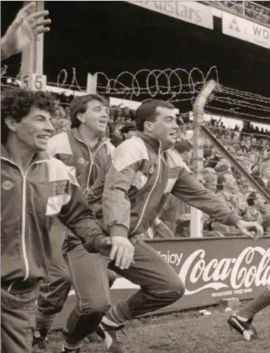  ??  ?? Substitute­s Kevin Foley, Padarig Coyle, Donal Smyth, Brendan Reilly and Liam Smith, along with Gerry McEntee (centre), rush onto the pitch at the final whistle of the 1988 All-Ireland final replay.