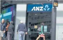  ?? Photo / Steven McNicholl ?? ANZ made the biggest cutbacks, reducing its branch numbers by 12 to 179.
