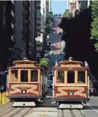  ?? ERIC RISBERG/AP ?? San Francisco’s iconic cable cars are more than a nostalgic way to get around and a popular tourist attraction: They’re registered as a National Historic Landmark.