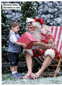  ??  ?? meeting father christmas in July