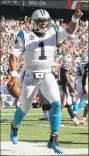  ?? Steven Senne / Associated Press ?? Panthers quarterbac­k Cam Newton celebrates his rushing touchdown against the Patriots during the second half Sunday in Foxborough, Mass.
