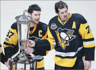  ?? CP PHOTO ?? Centre Sidney Crosby, left, and Evgeni Malkin lead the Pittsburgh Penguins into tonight’s Game 1 of the Stanley Cup Final.