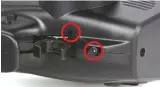  ??  ?? Trigger tension is set via a hidden screw (top circle), and trigger position can be moved fore and aft about 7mm (bottom circle). Wheel tension is also adjustable. The screw visible in the trigger itself isn’t an adjustment—it just holds the trigger in place.