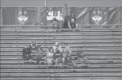  ?? BRAD HORRIGAN/HARTFORD COURANT ?? The UConn crowd was small at Rentschler Field on Saturday as South Florida rolled past the Huskies 48-22.