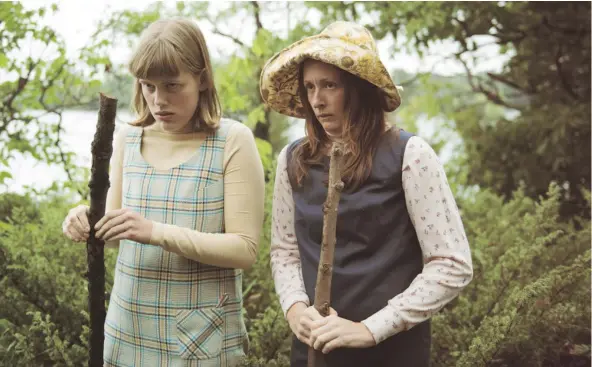  ?? — PNG FILES ?? Actors Kelly McCormack, left, and Caitlin Driscoll play twin sisters in the CBC digital series The Neddeaus of Duqesne Island. The 10-part show is a comedy mockumenta­ry about an odd, potato-eating family living on a remote island.