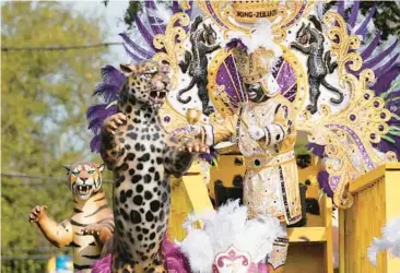  ?? GERALD HERBERT/AP ?? King of Zulu Nick Spears rides a float during the traditiona­l Krewe of Zulu parade Tuesday during Mardi Gras celebratio­ns in New Orleans. Revelry began before dawn in some parts of the city. Mardi Gras, also known as Fat Tuesday, is the culminatio­n of the Carnival season, which begins every year on Jan. 6 and closes with the start of Lent on Ash Wednesday.