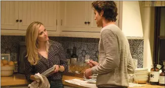  ?? KAREN BALLARD/ OPEN ROAD FILMS VIA AP ?? This image released by Open Road Films shows Reese Witherspoo­n, left, a scene from "Home Again."