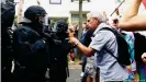  ??  ?? Police arrested a number of people after scuffles between police and protesters in Berlin