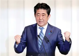  ?? REUTERS ?? SINZO ABE, Japan’s prime minister and ruling Liberal Democratic Party (LDP) leader, delivers a speech during a meeting at the party’s headquarte­rs in Tokyo in this Sept. 10 photo.