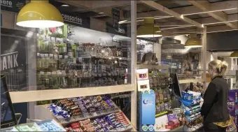  ??  ?? Retail shops that have remained open have erected screens to protest workers and the public like this one in Centra, Castle Street, Sligo.