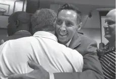  ?? AP PHOTO ?? Basketball Hall of Fame inductee Steve Nash hugs a fan after a news conference at the Naismith Memorial Basketball Hall of Fame on Thursday in Springfiel­d, Mass.