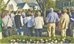  ?? PHOTO BY RUTHIE WINDSOR-MANN (LEFT); COURTESY PHOTO ?? Trinity Episcopal Church’s Easter Sunrise Service at Greenwood Farm in Gid Brown Hollow. Coffee and hot cross buns were served afterward in the barn. Above: The Way of the Cross walk around Little Washington on Good Friday.