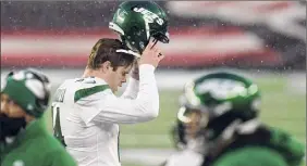  ?? Charles Krupa / Associated Press ?? QB Sam Darnold said, “I want to be a Jet for life. I want to turn this thing around. I believe we can.” It remains to be seen if management agrees.