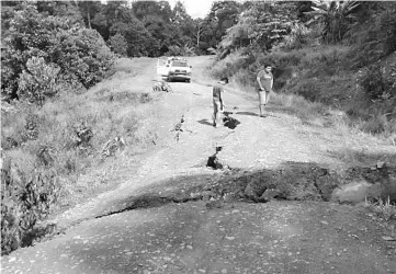  ??  ?? Sections of the road to Bario which are now damaged and needing immediate repair as the road is now not passable to four-wheel-drive vehicles.