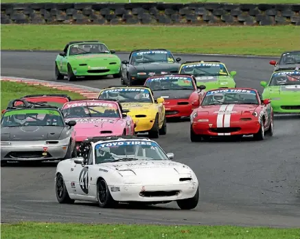  ?? PHOTO: STEW WOOD PHOTOGRAPH­Y ?? Matt Dilly leads the MX5 field during round two of the Manawatu Car Club’s Winter Race Series at Manfeild on Sunday.