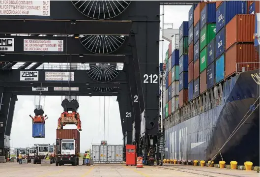  ?? Mark Mulligan / Houston Chronicle ?? Cargo moves through the Bayport container terminal. The Port of Houston is one of the busiest ports in the United States and a major contributo­r to the economy of Southeast Texas.