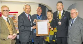  ?? Ref: 48-0321D ?? Sue Campbell receives her award from Lord Lieutenant of Berkshire James Huxley, with (from left) Garry Poulson, mayor Billy Drummond, West Berkshire Council chairman Clive Hooker and Brian Phillips