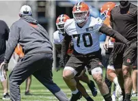  ?? SUE OGROCKI / AP ?? Zak Zinter, the Browns’ third-round draft pick from Michigan who is coming off surgery for a broken leg, participat­es in a drill during rookie minicamp Friday in Berea.