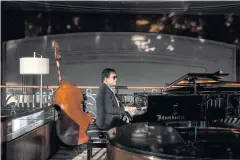  ??  ?? Jezrael Lucero plays piano at the Grand Hyatt in Wan Chai, Hong Kong.