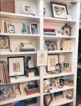  ?? SAM PARVEN/CARI SHANE VIA AP ?? Backwards books on a shelf in the Washington, D.C. home of Cari Shane.