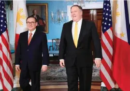  ?? AP ?? WALANG IWANAN Sina Foreign Secretary Teodoro Locsin at U.S. Secretary of State Mike Pompeo (kanan) sa Treaty Room ng State Department sa Washington, nitong Huwebes.