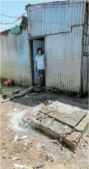  ?? Picture: WERNER HILLS ?? ONGOING PROBLEM: Joslynn Joseph has been living next to a massive overflowin­g drain for the past four years in Cobus Road, Helenvale. The sewage runs underneath her house