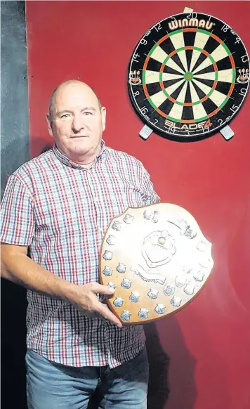  ??  ?? Halton Stadium player Alan Magee won the Karalius Bros. Individual­s’ title at the Widnes & District Darts League’s Finals Night hosted by Mill Brow SC. He defeated John Glover from the Wellington 2-1.