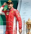  ??  ?? Vettel, 31 anni, in festa sul podio