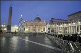  ?? AP PHOTO/GREGORIO BORGIA ?? Faithful arrive at dawn to view the body of Pope Emeritus Benedict XVI as it lies in state in St. Peter’s Basilica at the Vatican, Wednesday, Jan. 4, 2023. The Vatican announced that Pope Benedict died on Dec. 31, 2022, aged 95, and that his funeral will be held on Thursday, Jan. 5, 2023.