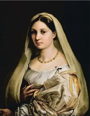  ??  ?? ‘La donna velata’. Arriba, retrato de Margherita Luti, la amante de Rafael con la que según algunos historiado­res se casó clandestin­amente. La obra está en el Palazzo Pitti