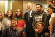  ?? LISA MITCHELL - MEDIANEWS GROUP ?? Gov. Tom Wolf with Kutztown University students during his visit to campus on March 4. On a tour of the 14 PASSHE schools, Wolf is promoting his proposed Nellie Bly Scholarshi­p that addresses the student loan debt in Pennsylvan­ia.