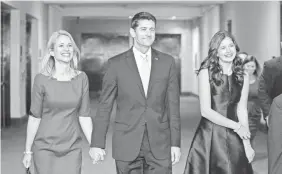  ?? J. SCOTT APPLEWHITE/AP ?? Paul Ryan, with wife Janna and daughter Liza, was drafted to the speaker’s job.