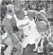  ?? JIM RASSOL/STAFF PHOTOGRAPH­ER ?? Dwyane Wade said he won’t be playing tonight after he suffered a hamstring strain. He is listed as doubtful against Portland.