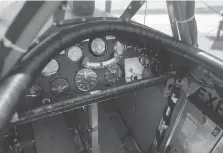  ??  ?? The cockpit of the Nieuport 11 commemorat­ive biplane is open to the elements and features only basic instrument­s.