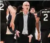  ?? Bebeto Matthews/Associated Press ?? UConn head coach Dan Hurley, center, reacts during the second half against St. John’s on Saturday.