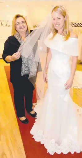  ?? Picture: MIKE BATTERHAM ?? Mandy St George has changed her mind on what type of dress to wear on her big day after seeing the royal wedding and visiting Wendy Wright at Strictly Bridal, Main Beach.