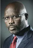  ??  ?? JOEL SAGET / AFP Antiga estrela do futebol é o Presidente eleito da Libéria